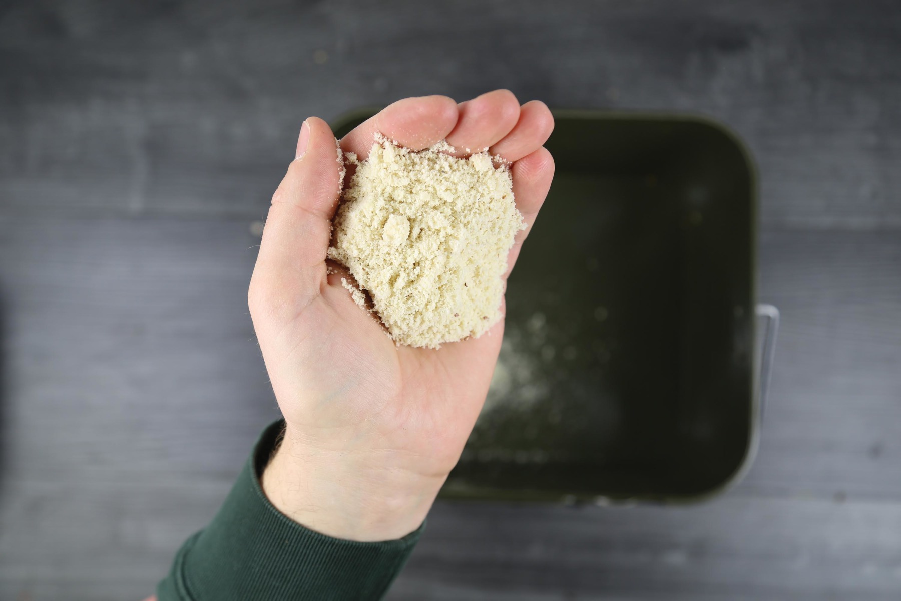 2. To help dry the casters out, you want to give them a quick coating in maize flour or groundbait.