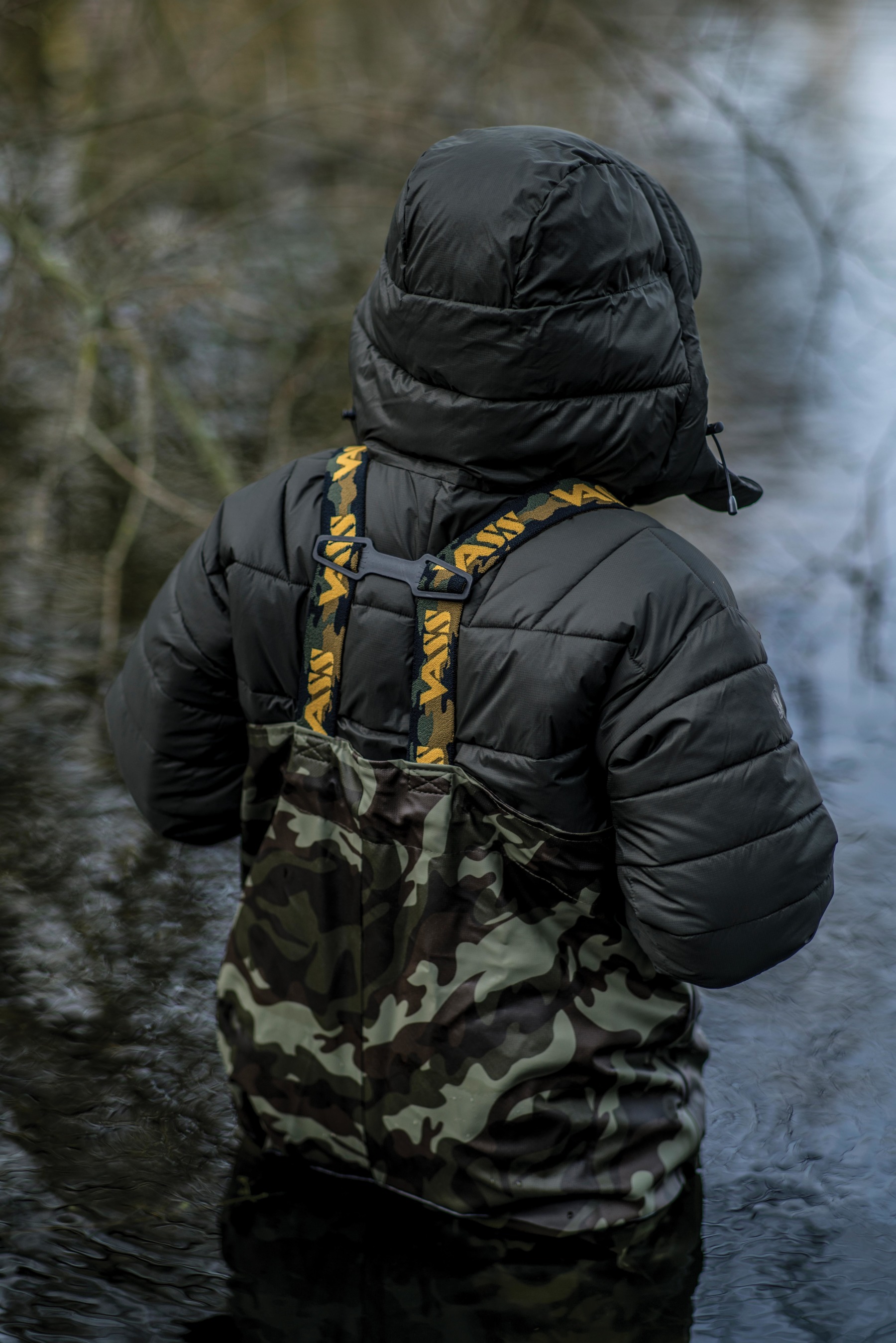 The strap has been inverted, with yellow writing against a camo background