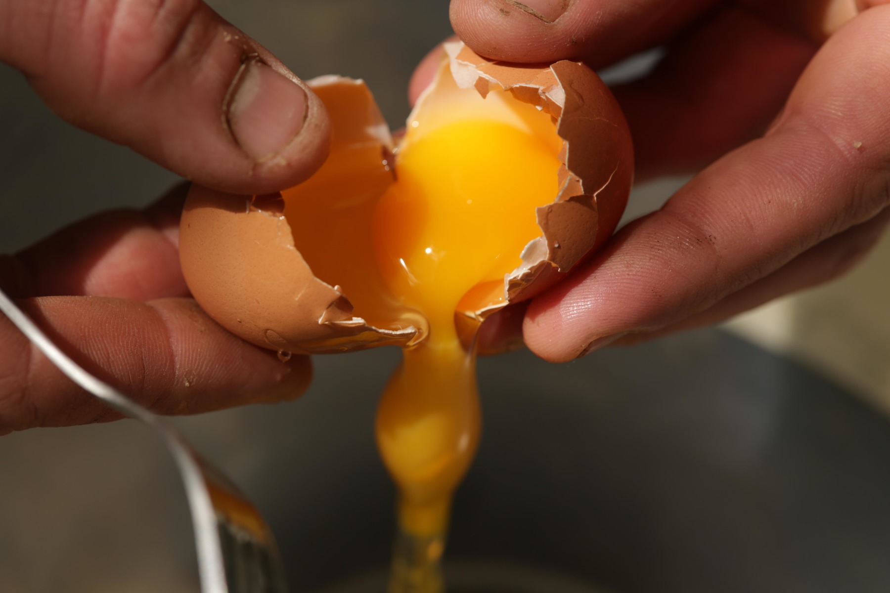 2. Start off by cracking three eggs into a large mixing bowl like so. 