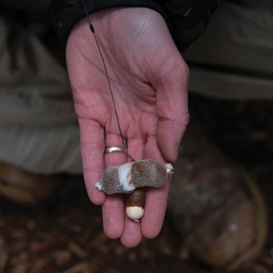 3. Add a couple more boilie halves and tie the bag off. You’ll be left with large food items round the hookbait but the point remains protected from the soft coating of the Krill Active. 