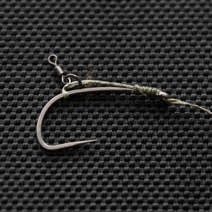 5. Secure the hook in place with a standard Knotless knot arrangement. 