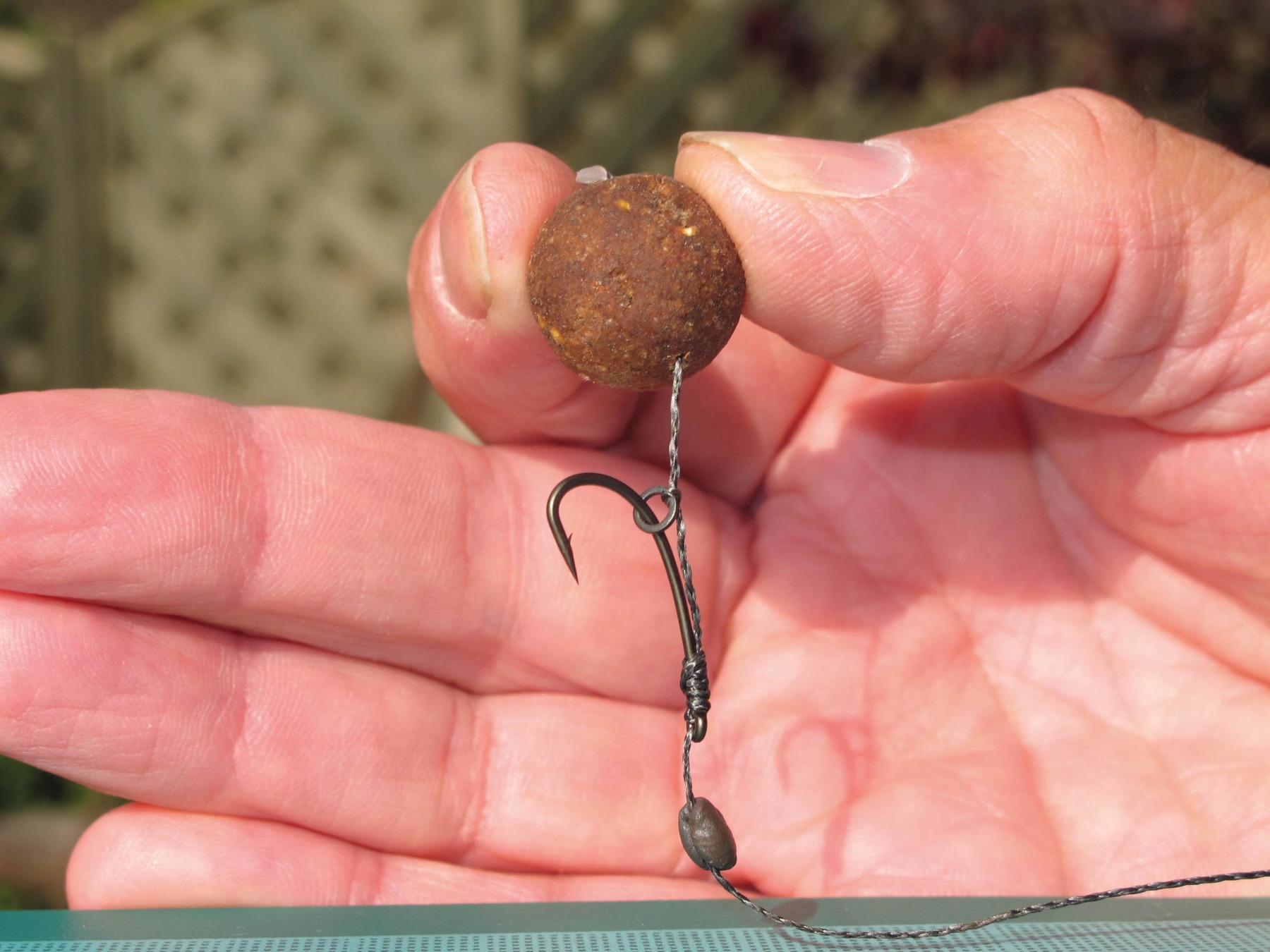 As you can see, by adding the counter-balance tungsten putty just below the eye of the hook, the hook will automatically cock and enter the carp’s mouth bend first, every time